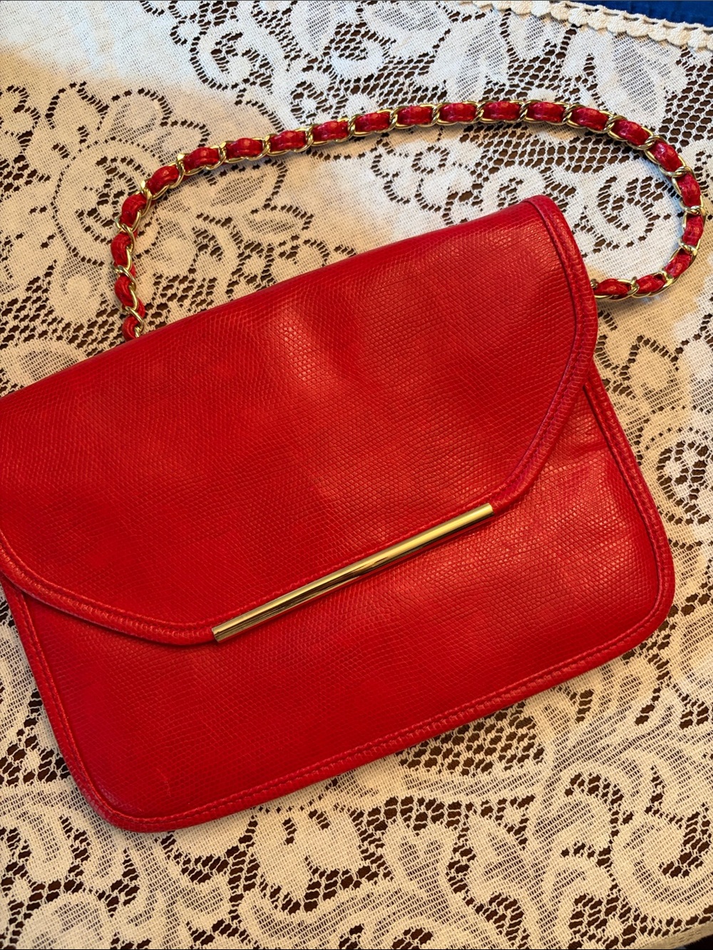 Red imitation leather bag.